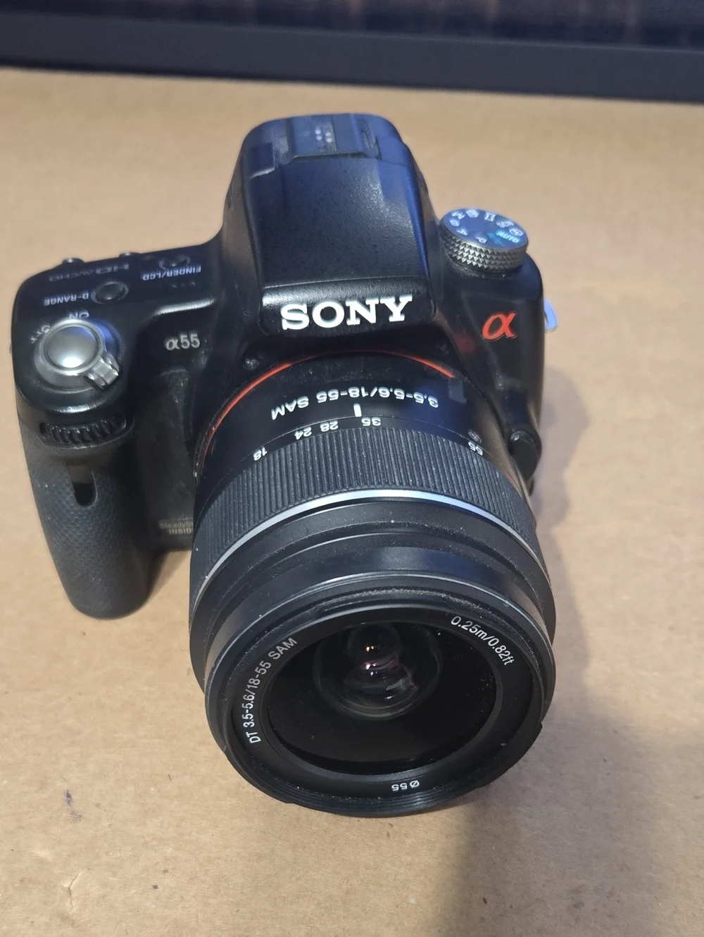 Sony DSLR Camera in Black with Black Zoom Lens